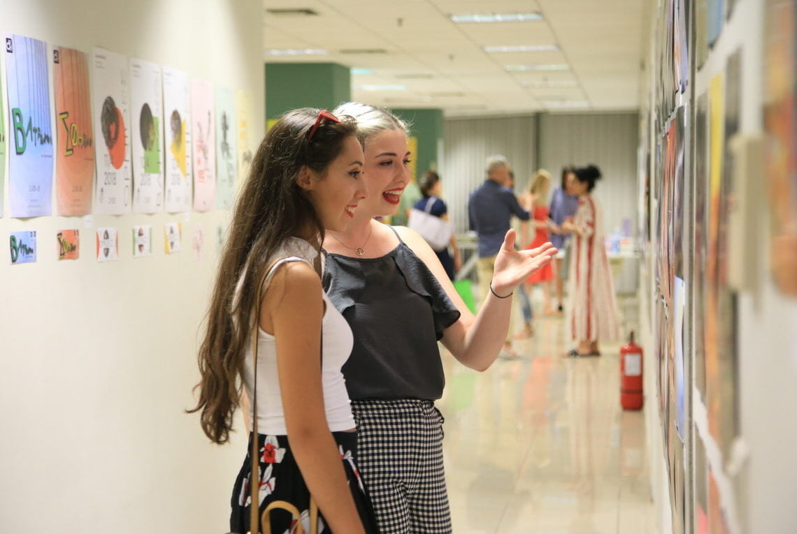 people on an exhibition